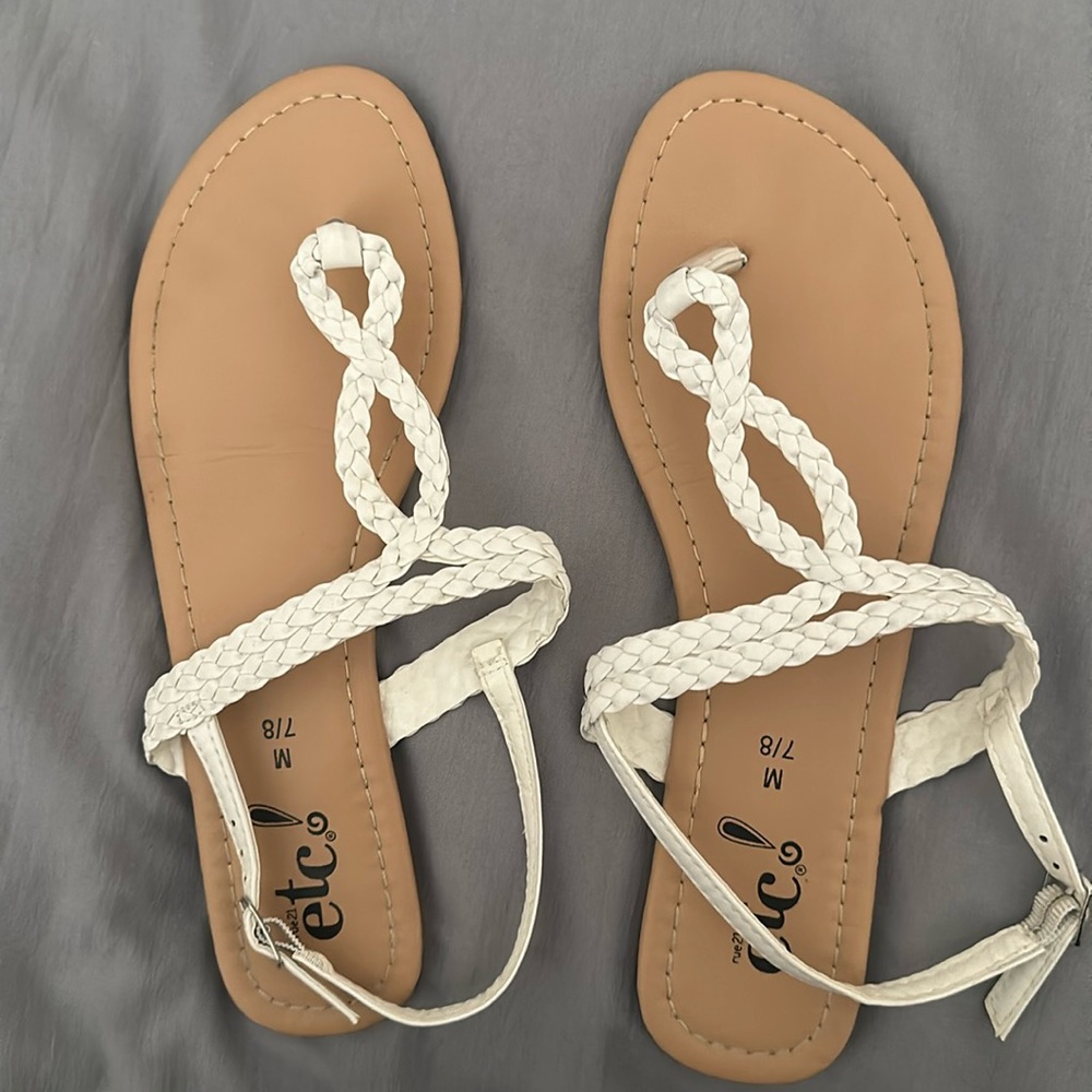 Woman’s white sandals